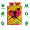 Softball quilt bedding set displayed with colorful player artwork and breathable, washable product feature icons