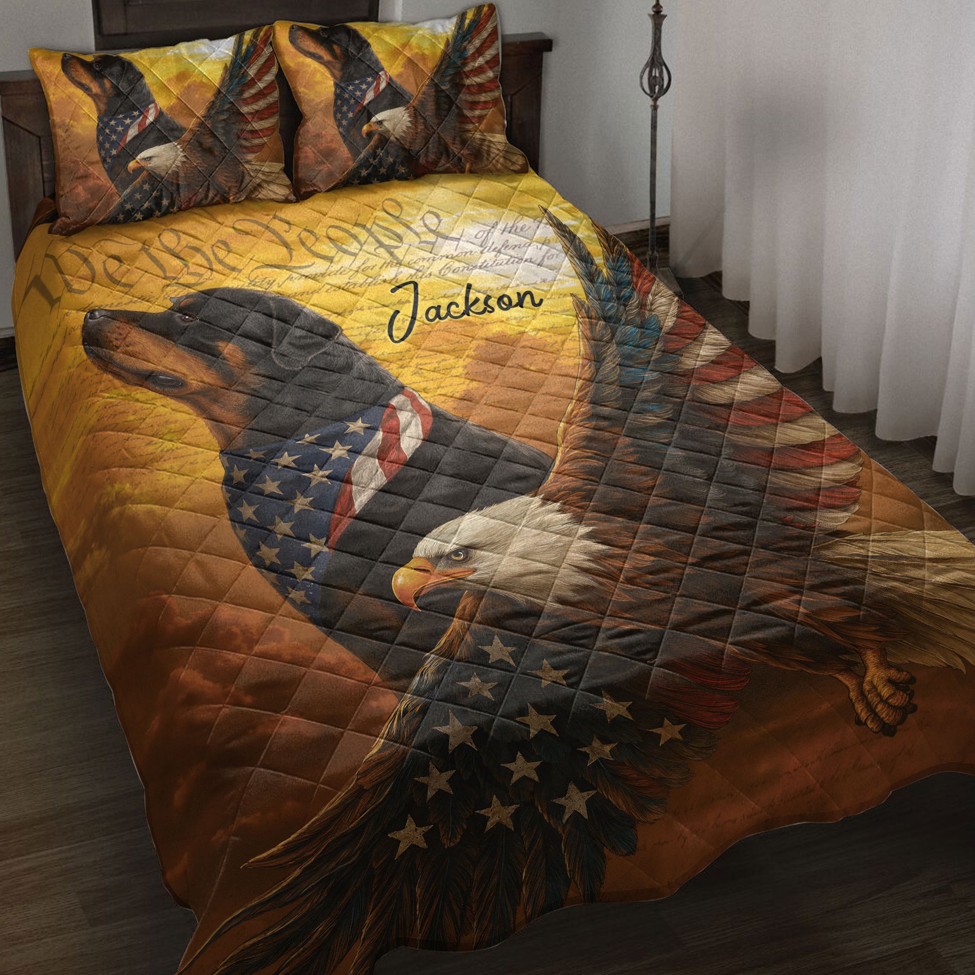 Rottweiler and bald eagle quilt blanket displayed on a bed with patriotic artwork