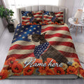 Boston Terrier quilt bedding set styled on a bed with American flag stripes, stars, and red poppy borders