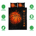 Black quilt bedding set with vivid orange basketball artwork shown with soft breathable and machine washable icons