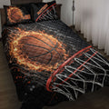 Basketball quilt blanket displayed on a bed with fiery orange basketball and hoop net artwork