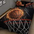 Close view of basketball quilt blanket featuring a fiery basketball, hoop, and net on black artwork