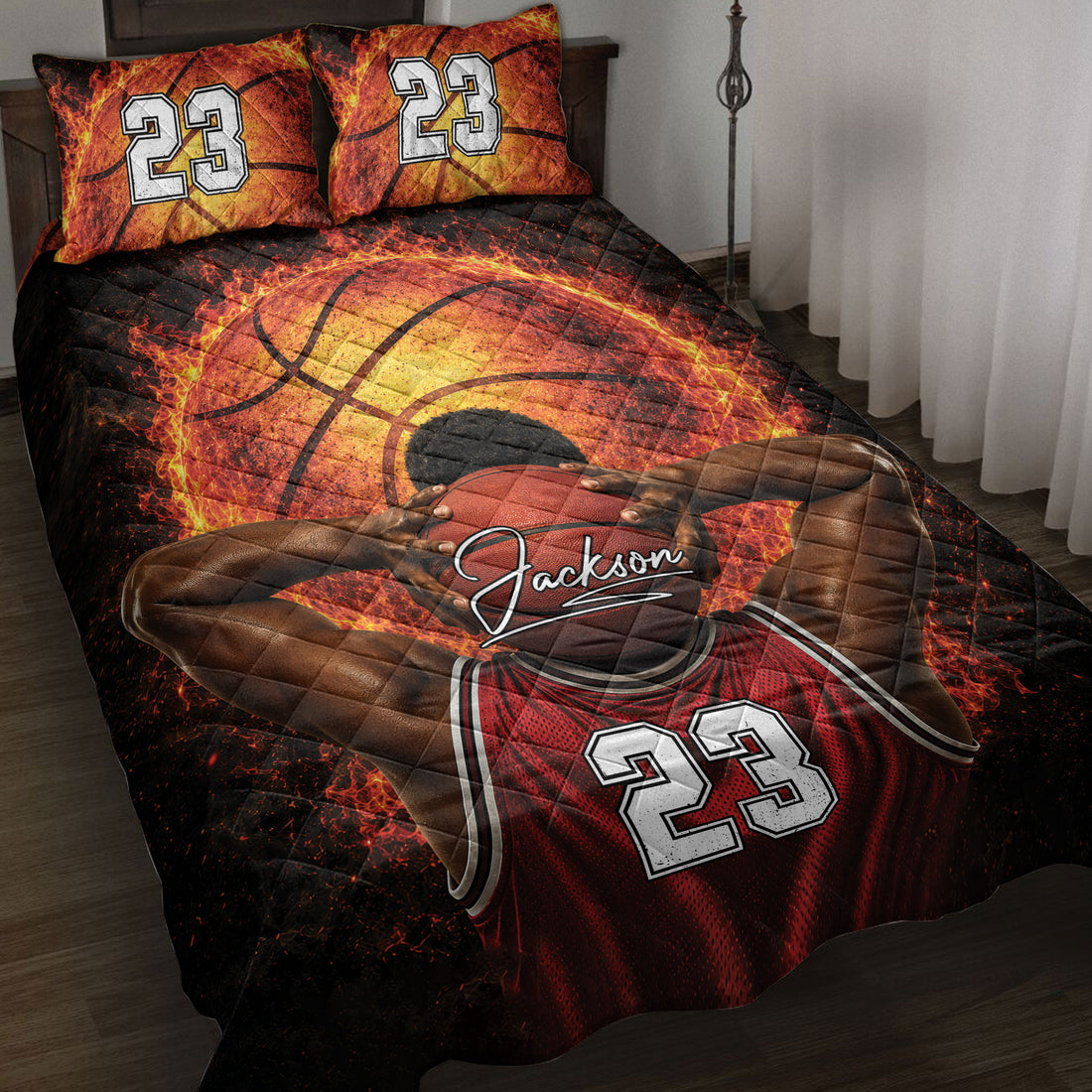 Fiery basketball quilt blanket displayed on a bed with a basketball player graphic and bold red and black artwork