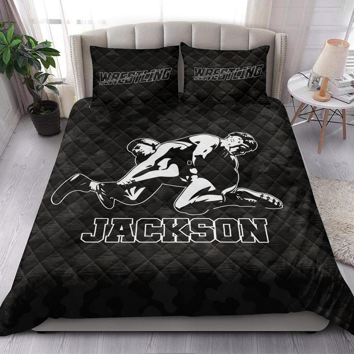 Wrestling quilt blanket styled in a bright bedroom with dramatic black and white grappling artwork