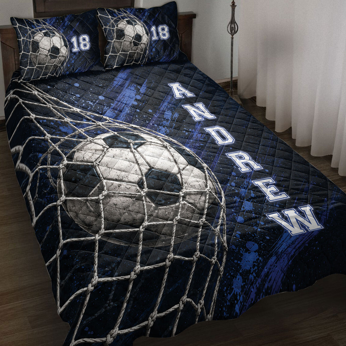Soccer quilt blanket bedding set displayed on a bed with blue goal net and ball artwork