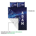 Hockey quilt blanket showing the printed blue side and white quilted backing in a product detail view