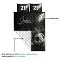Soccer quilt showing the printed front design and white quilted backing