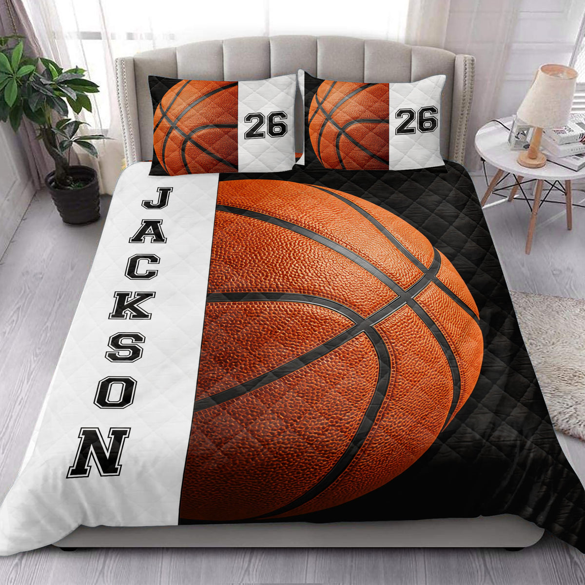 Basketball quilt blanket styled in a bright bedroom with coordinating sports artwork