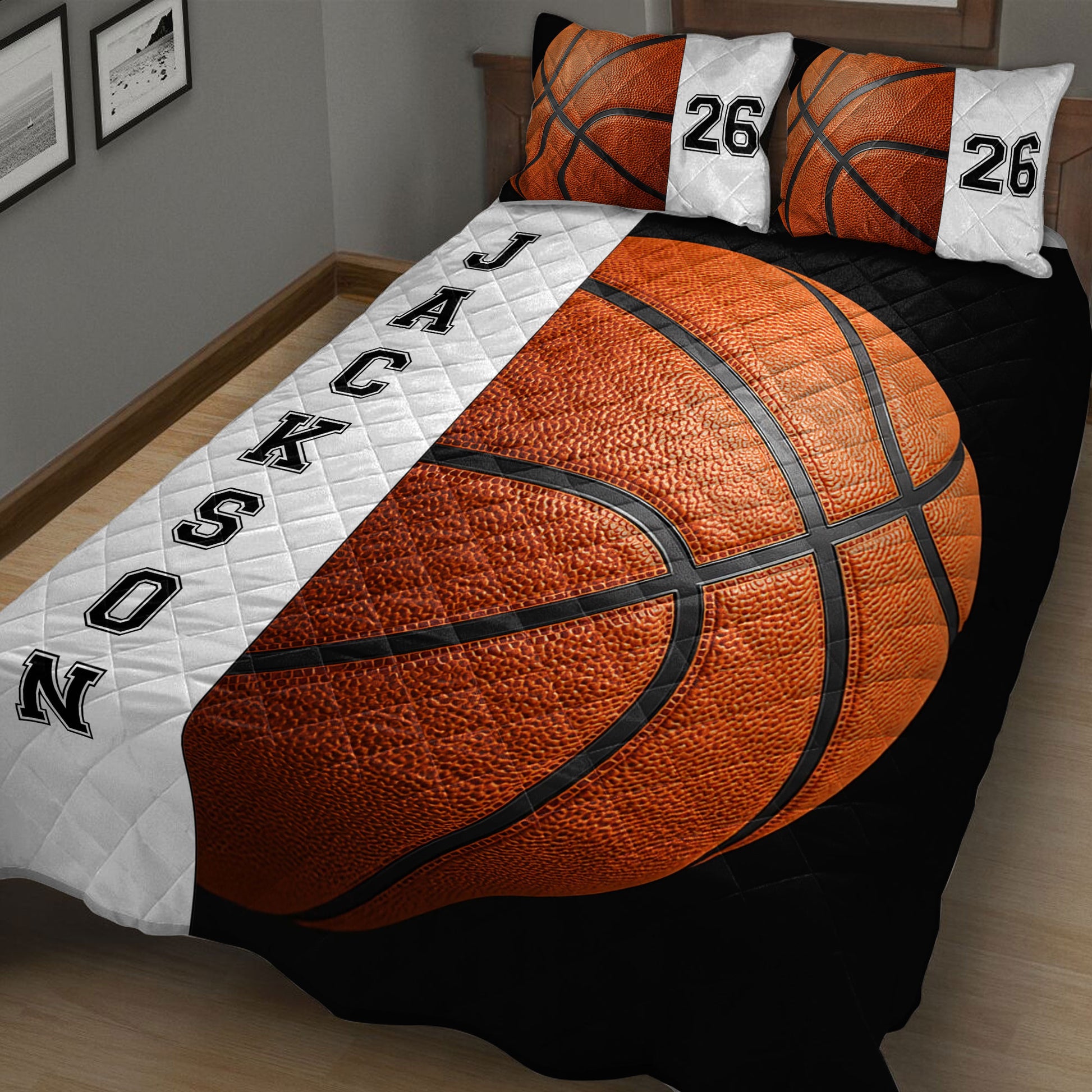 Close view of basketball quilt blanket featuring oversized orange basketball artwork