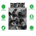 Hockey quilt bedding set shown flat with skate and puck artwork in a monochrome sports design