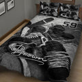 Angled bedroom view of a hockey quilt blanket featuring skates, sticks, pucks, and bold athletic graphics