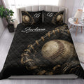 Baseball quilt bedding styled in a bedroom with glove and baseball artwork