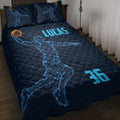 Dark navy basketball quilt blanket on a bed with glowing basketball player artwork