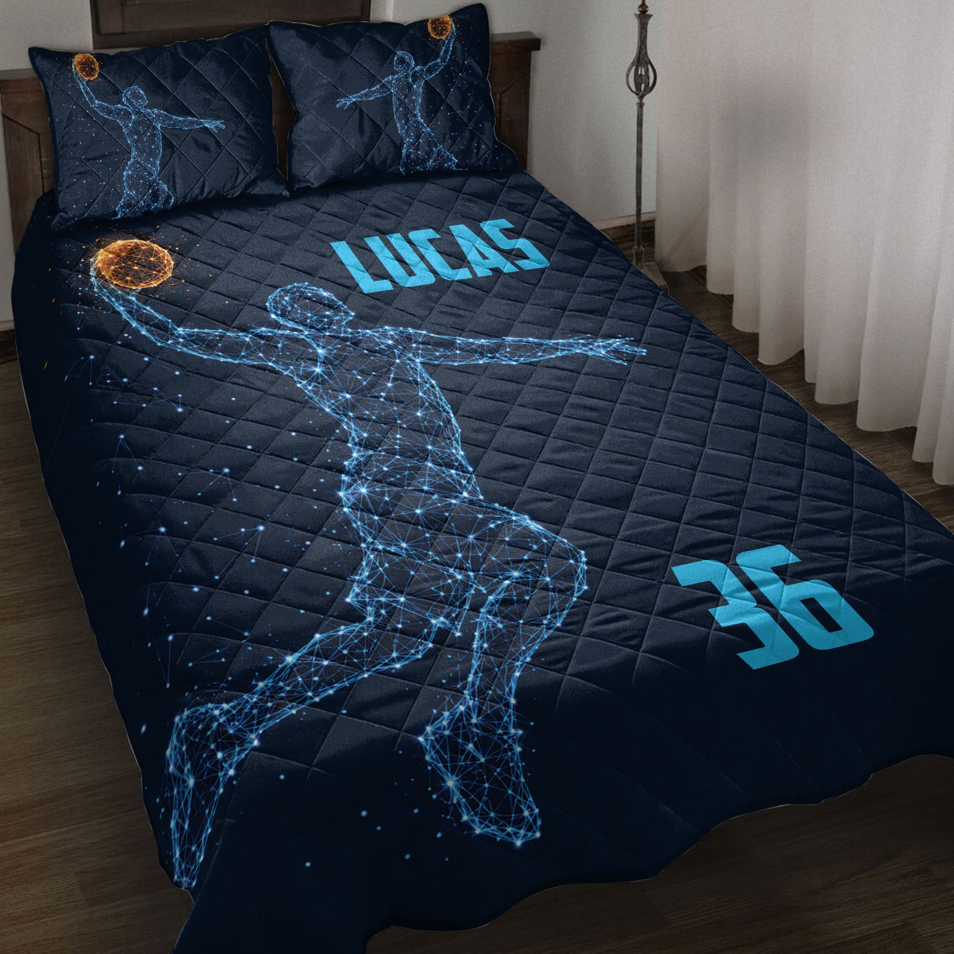Dark navy basketball quilt blanket on a bed with glowing basketball player artwork