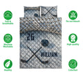 Hockey quilt bedding set shown flat with sticks, puck, net design, and blue sports artwork