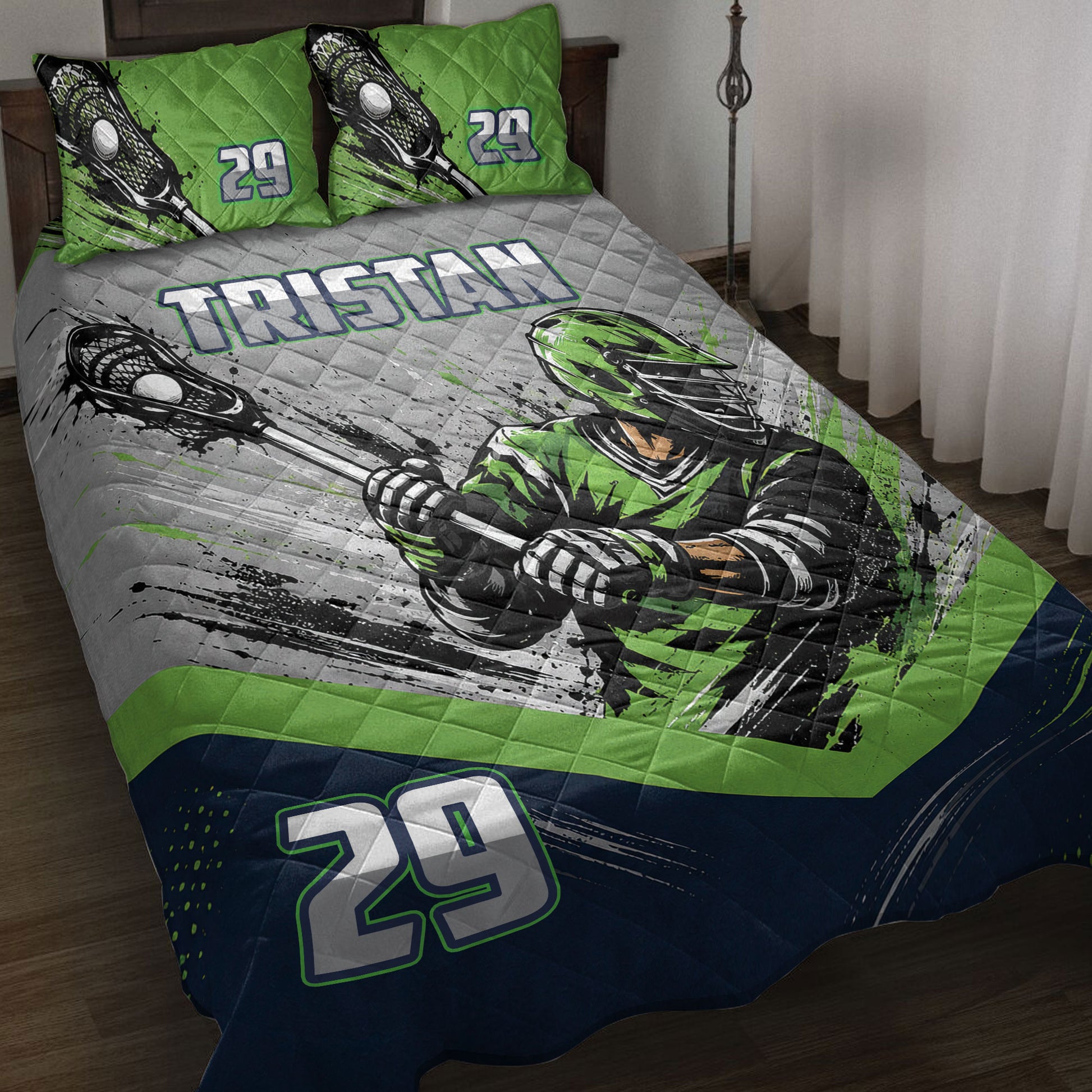 Lacrosse quilt blanket displayed on a bed with green, gray, navy, and black sports artwork