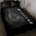 Black boxing quilt blanket displayed on a bed with detailed boxing glove artwork