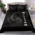 Boxing quilt bedding displayed in a bright bedroom with bold black sports artwork