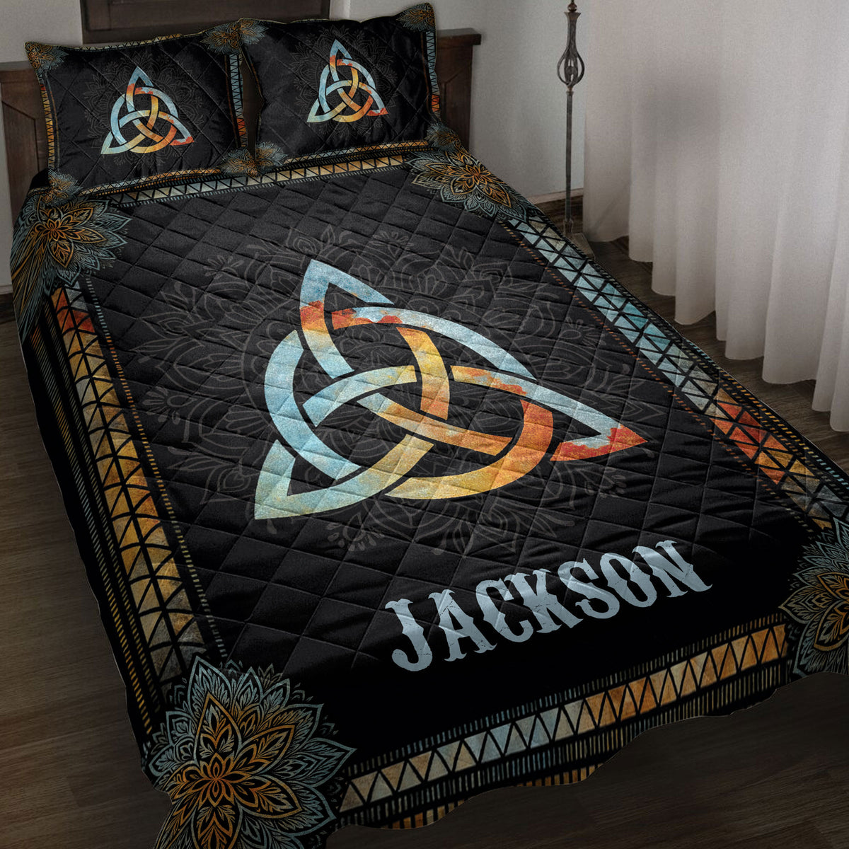 Wicca quilt blanket displayed on a bed with Celtic knot and mandala artwork
