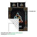 Wicca quilt showing the printed front and white quilted backing in a feature view