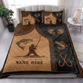 Fishing quilt blanket styled in a bedroom with bass artwork, angler silhouettes, hooks, and a brown black design