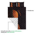 Guitar quilt bedding set showing the printed black and copper side and white quilt backing