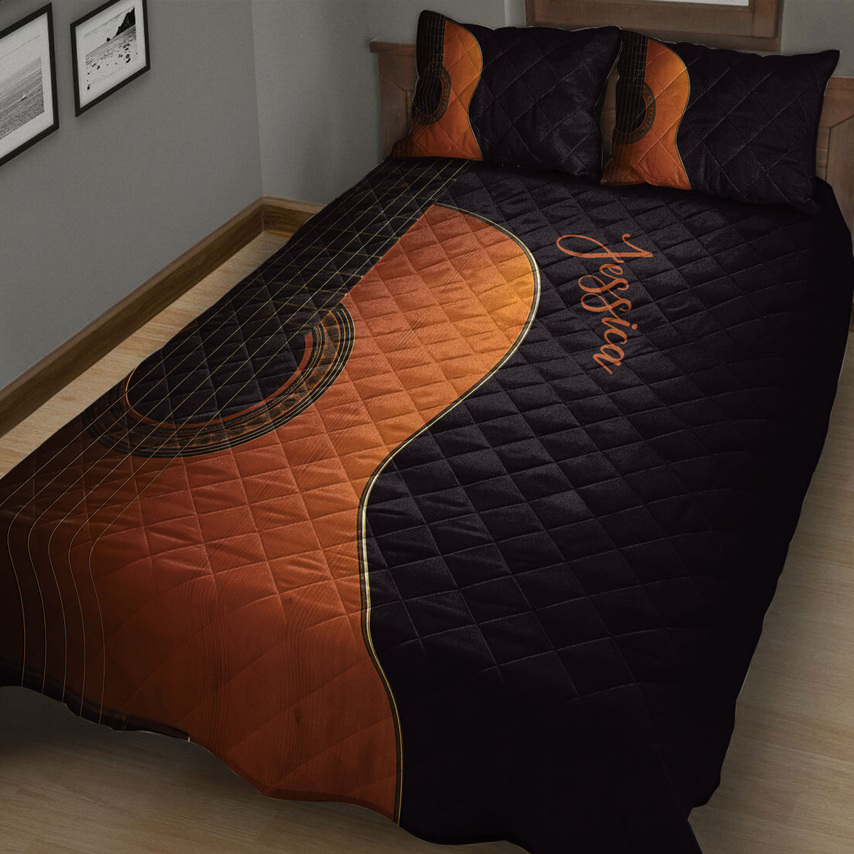 Close bedroom view of a black and copper acoustic guitar quilt blanket with matching pillow designs