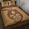 Elephant couple quilt blanket displayed on a bed with warm brown romantic artwork