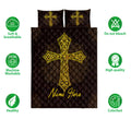 Christian cross quilt bedding set in black and gold shown with product feature icons