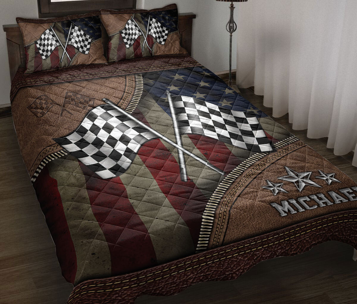 Racing quilt blanket displayed on a bed with crossed checkered flags, stars, and rugged motorsport artwork