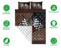 Racing quilt bedding set shown with crossed checkered flags, quilted detail, and product feature icons