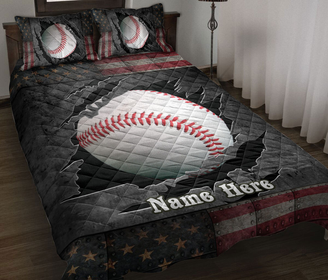 Baseball quilt blanket displayed on a bed with dark stars, distressed stripes, and bold sports artwork