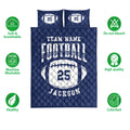 Navy football quilt bedding set shown with soft breathable and colorfast feature icons