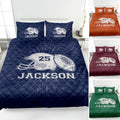 Navy football quilt blanket displayed on a bed with helmet, football, and bold sports artwork