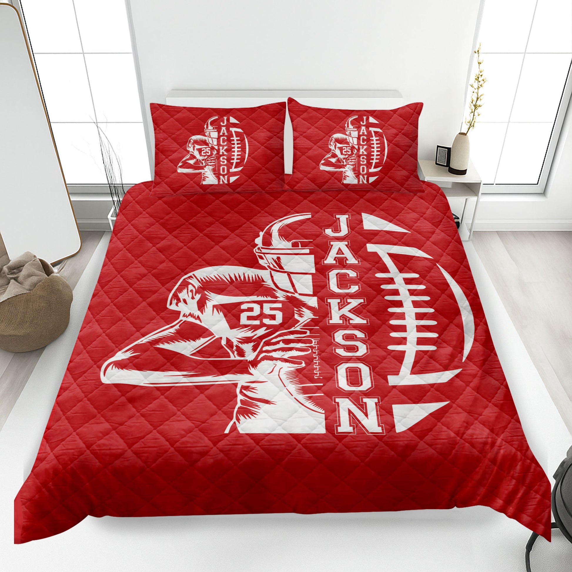 Red football quilt bedding displayed on a bed with strong sports artwork and quilted texture