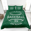 Green baseball quilt blanket featuring large baseball artwork in a bedroom setting