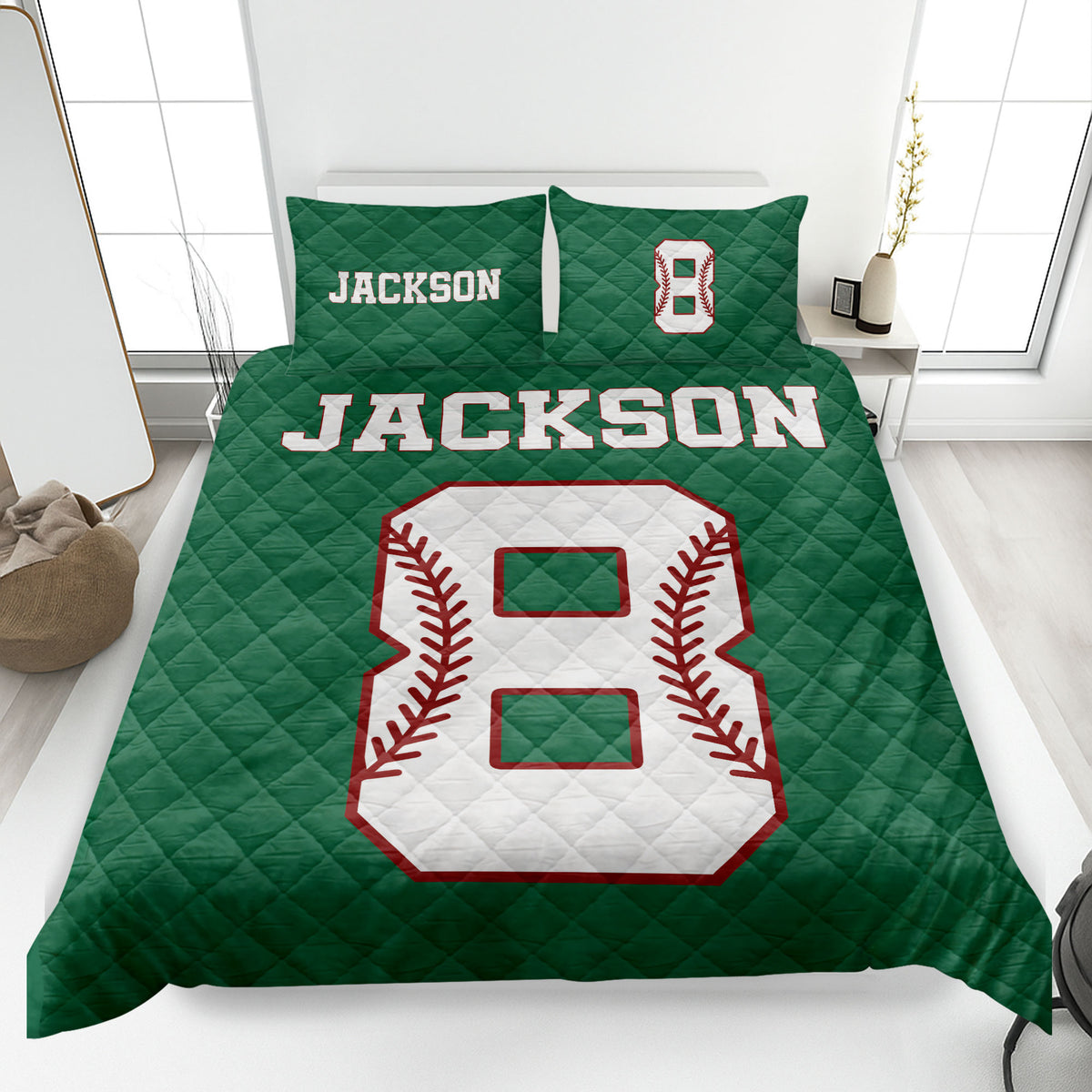 Green baseball quilt blanket styled in a bedroom with bold varsity-inspired sports artwork