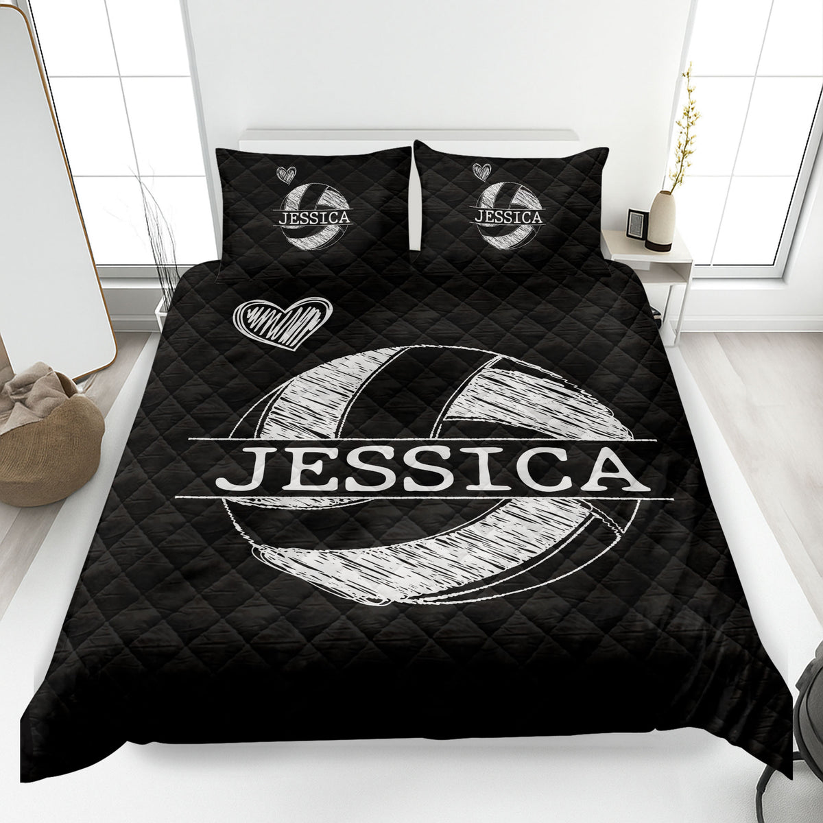 Black volleyball quilt bedding displayed in a modern bedroom with white graphic artwork