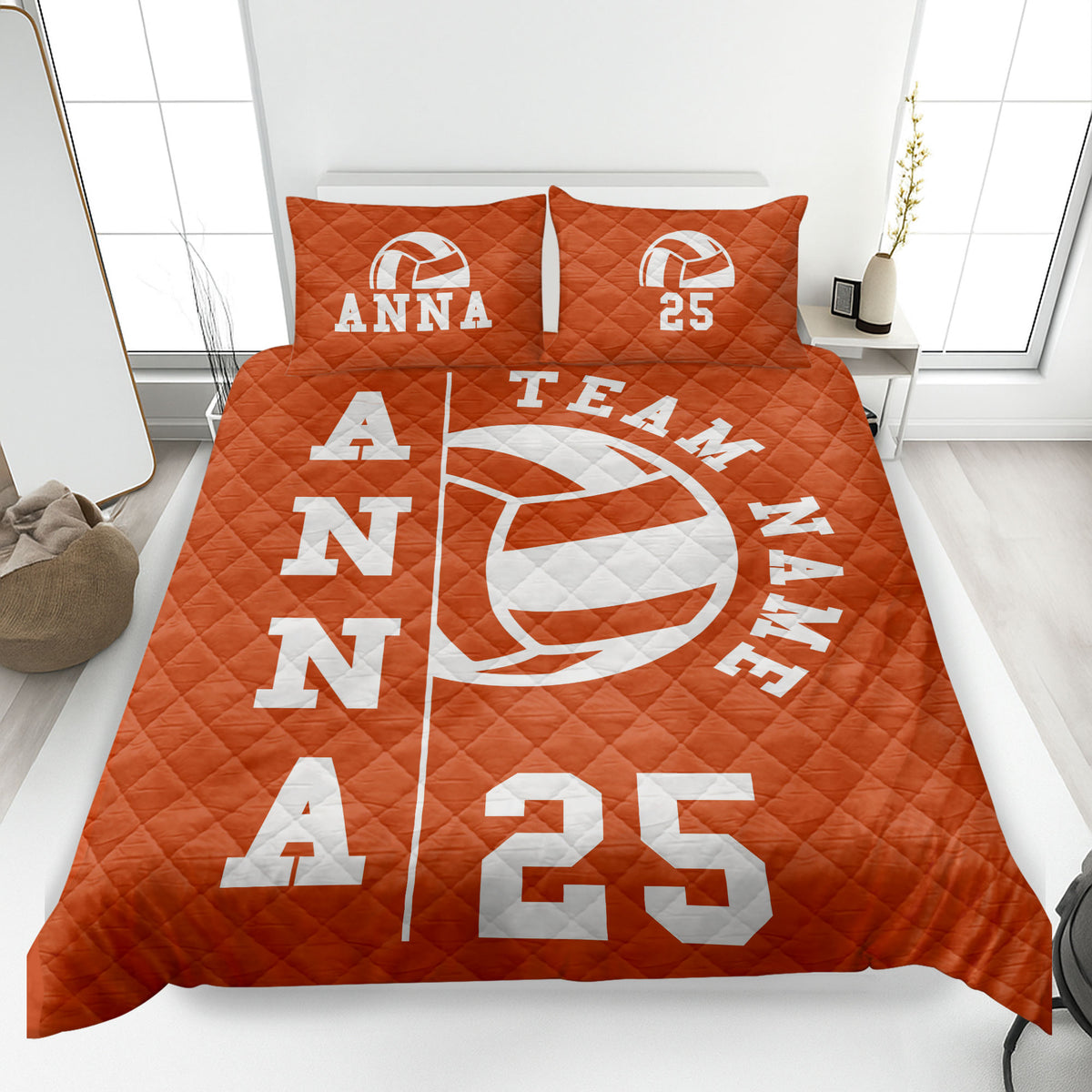 Orange volleyball quilt blanket featuring a large white volleyball graphic and athletic lettering