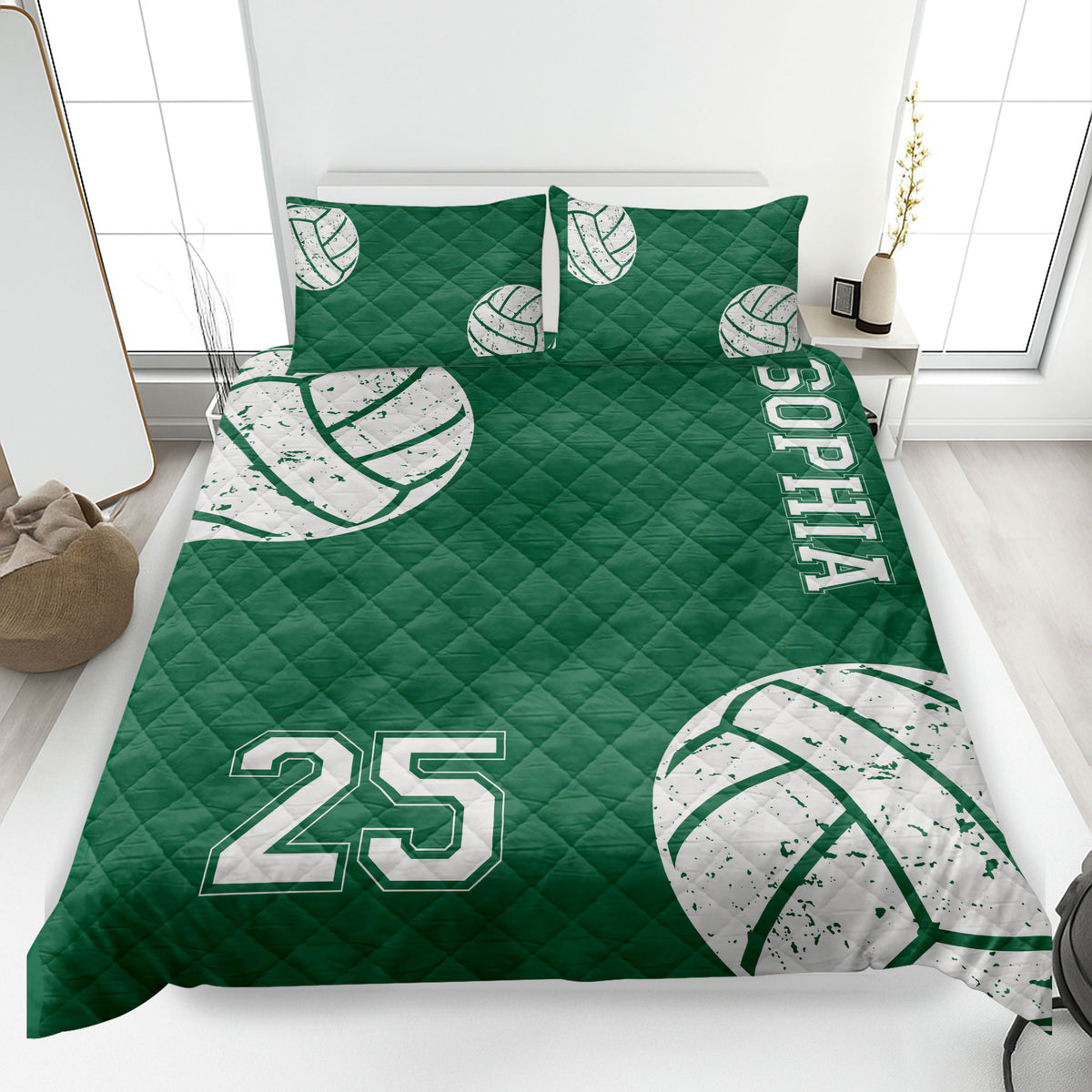 Green volleyball quilt blanket with distressed white volleyball graphics and bold athletic design