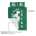 Soccer quilt showing the printed front and white quilted backing in a construction detail view