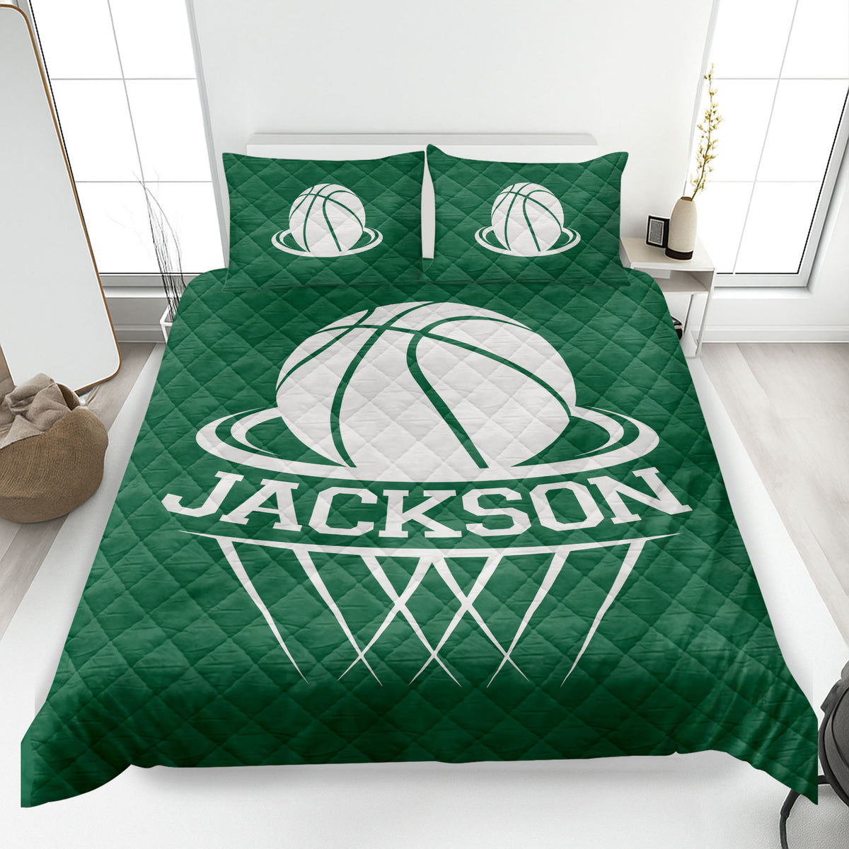 Green basketball quilt blanket styled in a bedroom with bold white basketball artwork