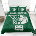 Green basketball quilt blanket on a bed with bold hoop artwork and team-inspired sports styling