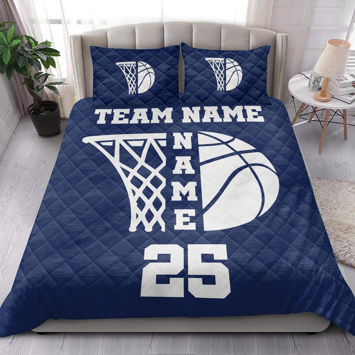 Navy basketball quilt bedding set styled in a bright bedroom with coordinated basketball artwork