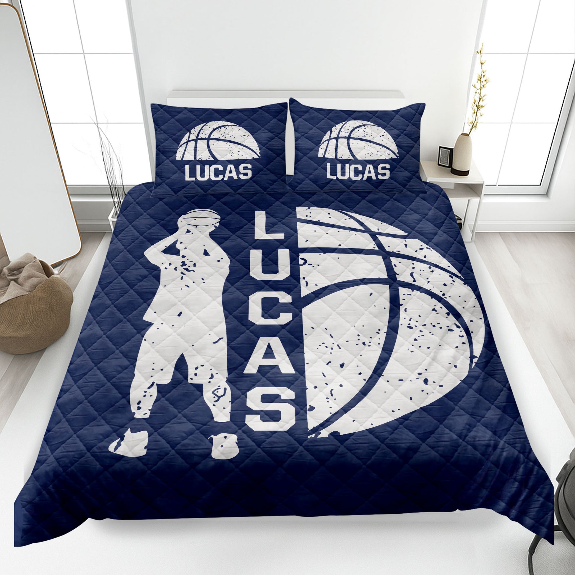Navy basketball quilt blanket featuring a large basketball, player silhouette, and bold monochrome sports artwork