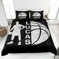 Black basketball quilt blanket displaying a dynamic player silhouette and large white basketball graphic