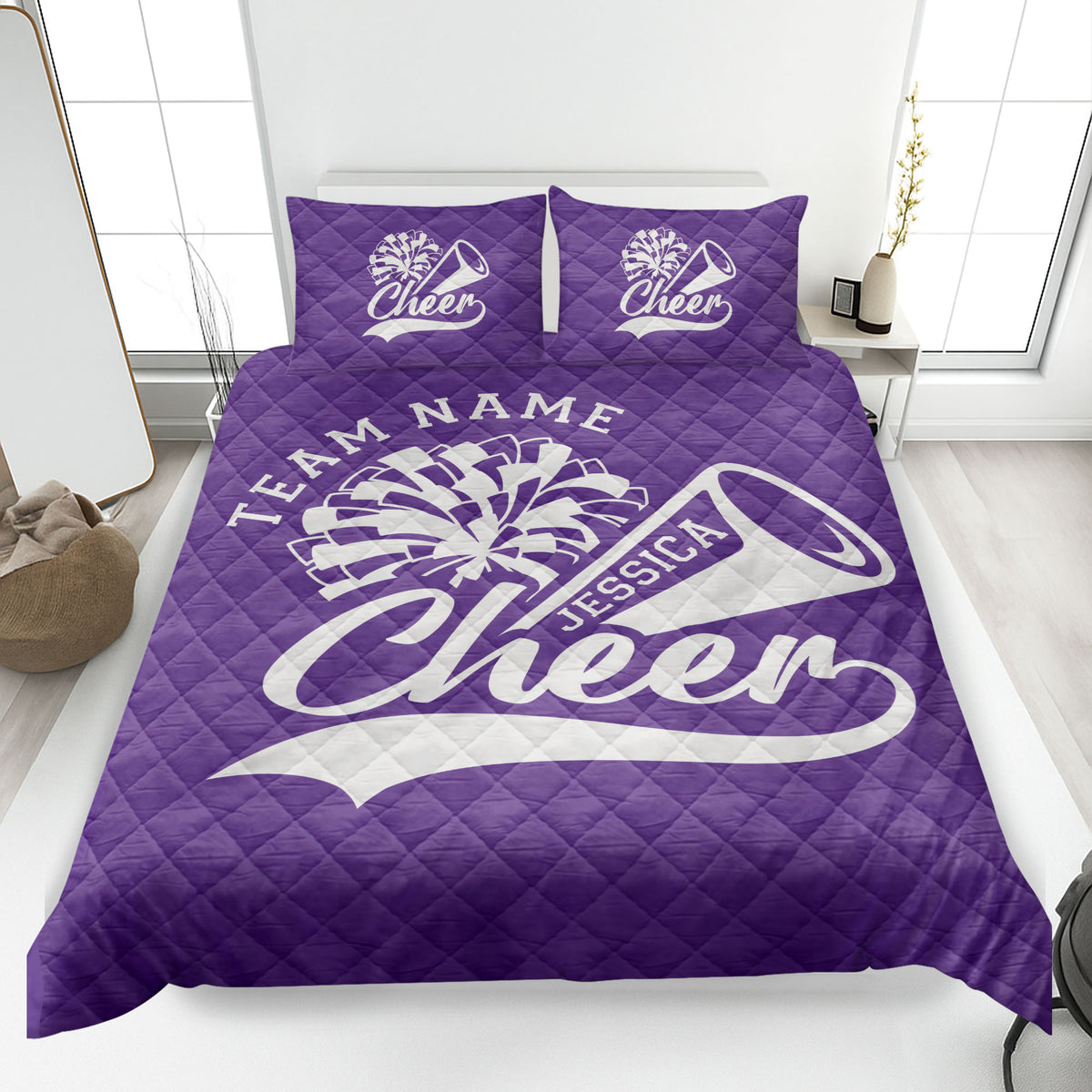 Purple cheerleading quilt blanket featuring bold pom-pom and megaphone sports artwork