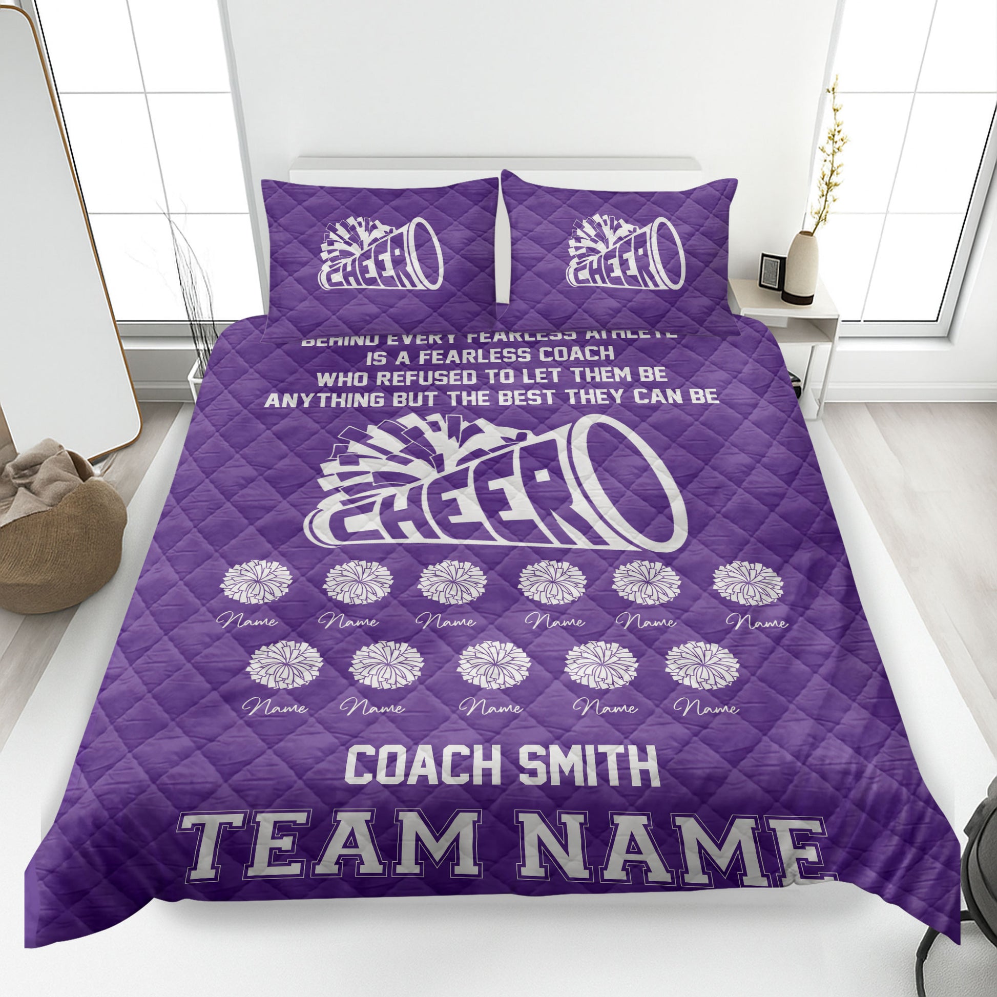 Purple cheerleading quilt blanket styled in a bedroom with bold megaphone and pom-pom graphics