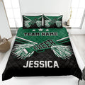 Green and black cheerleading quilt blanket featuring white pom-poms, stars, and athletic stripe details