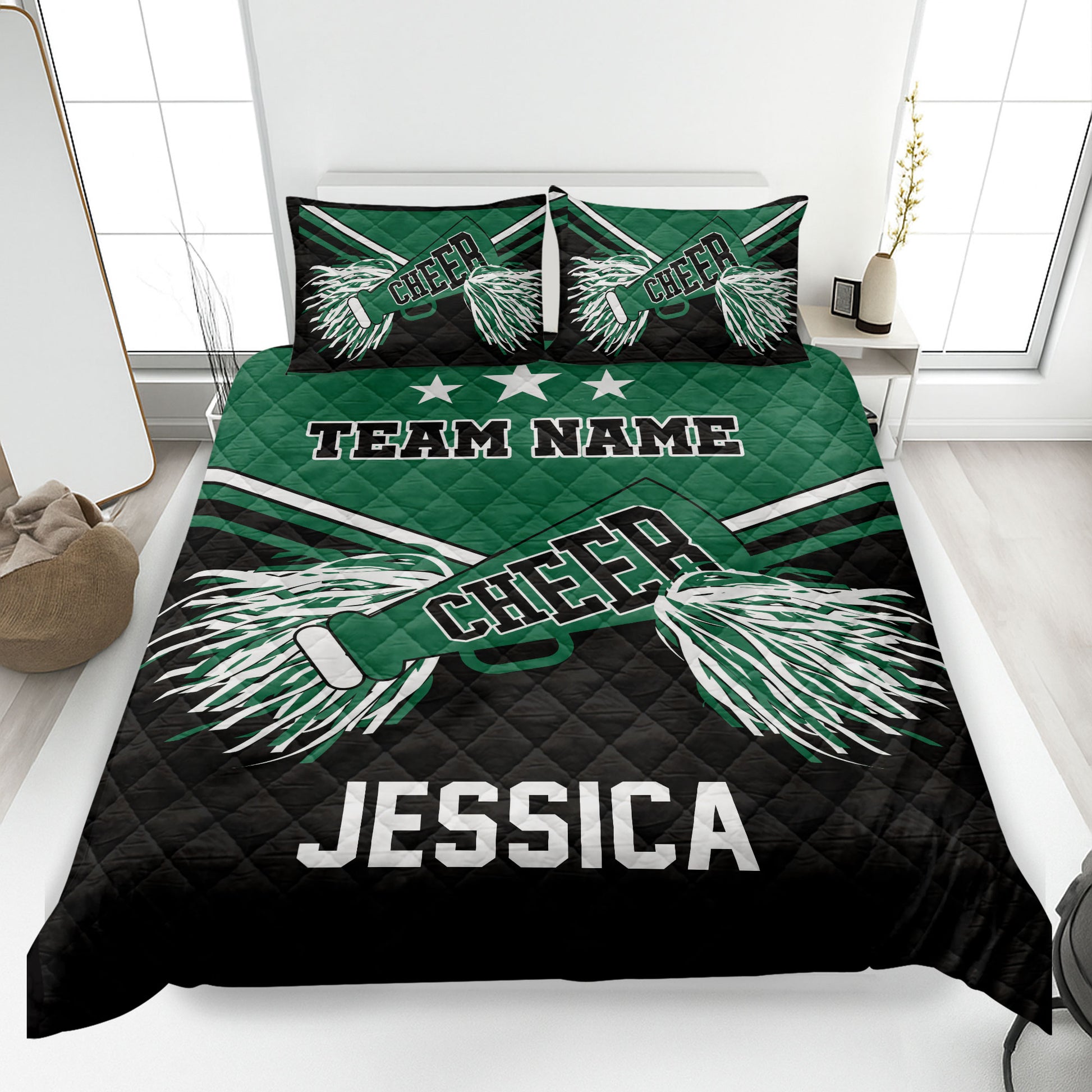 Green and black cheerleading quilt blanket featuring white pom-poms, stars, and athletic stripe details